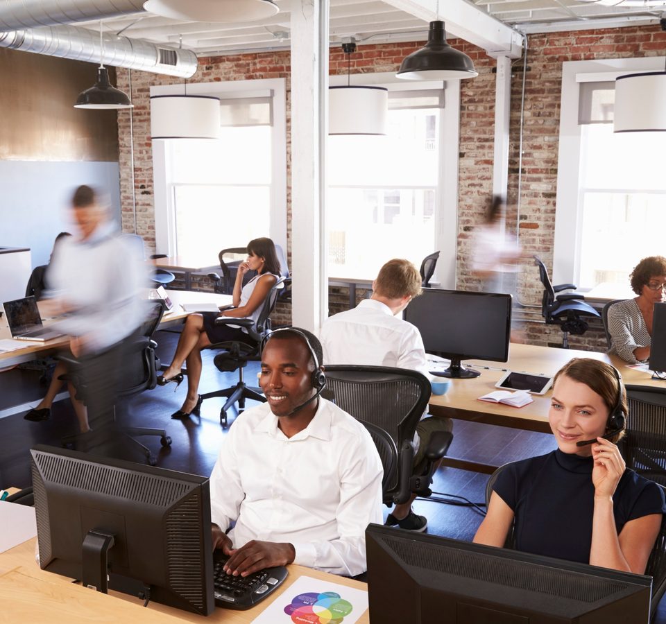 An open-plan customer service floor